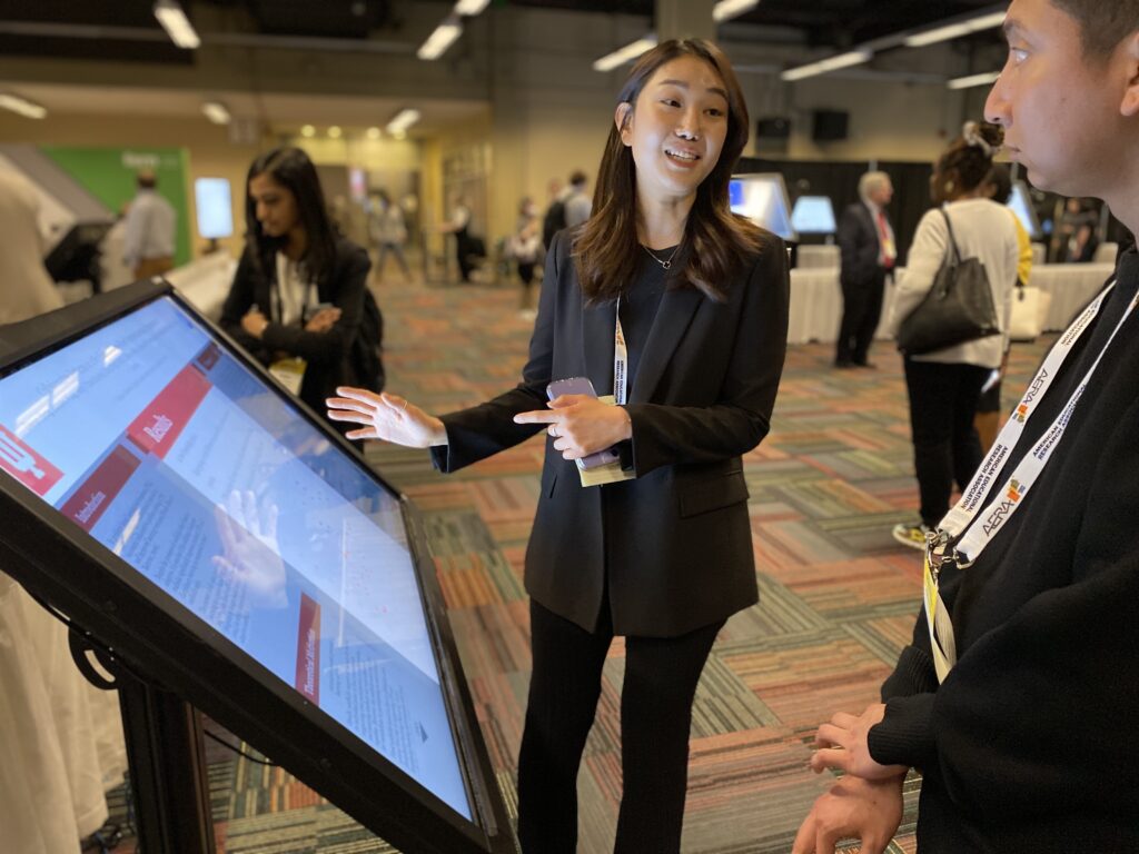 A presenter in the  i-Presentation hall at the American Educational Research Association AERA 2023 Annual Meeting 