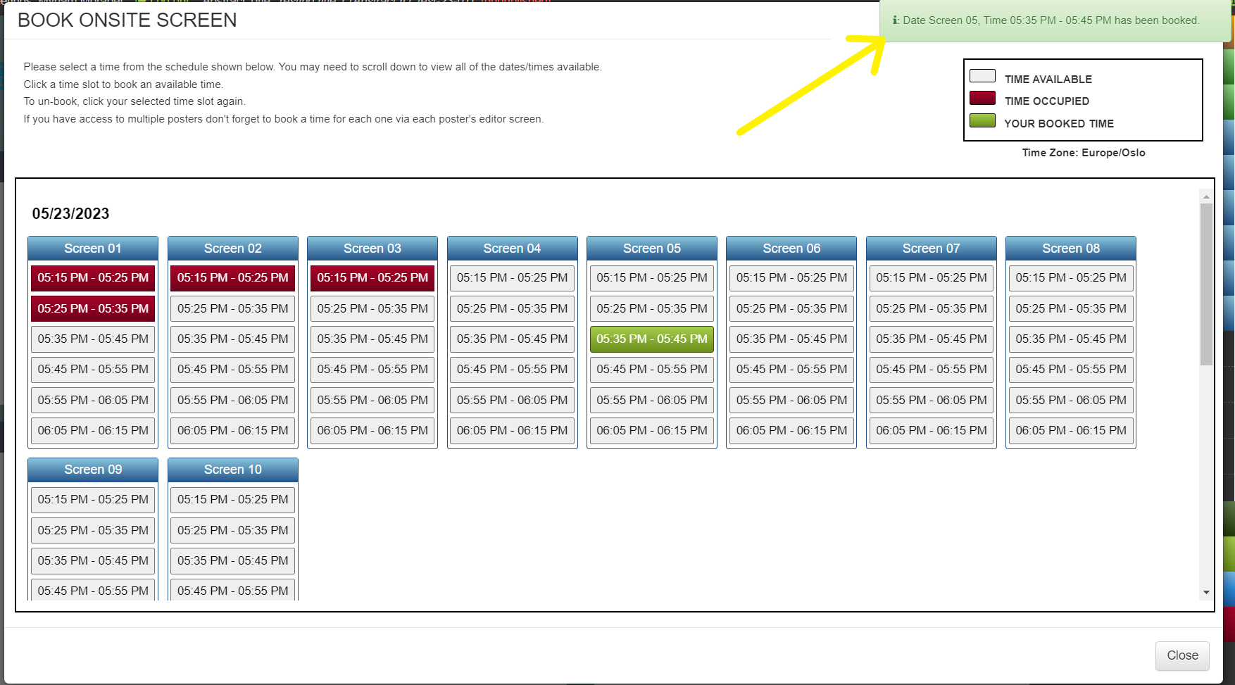 The 'Book Schedule time' screen with a time slot selected in green. There is a yellow arrow pointing to a pop up notification advising that the selected time has been booked. 